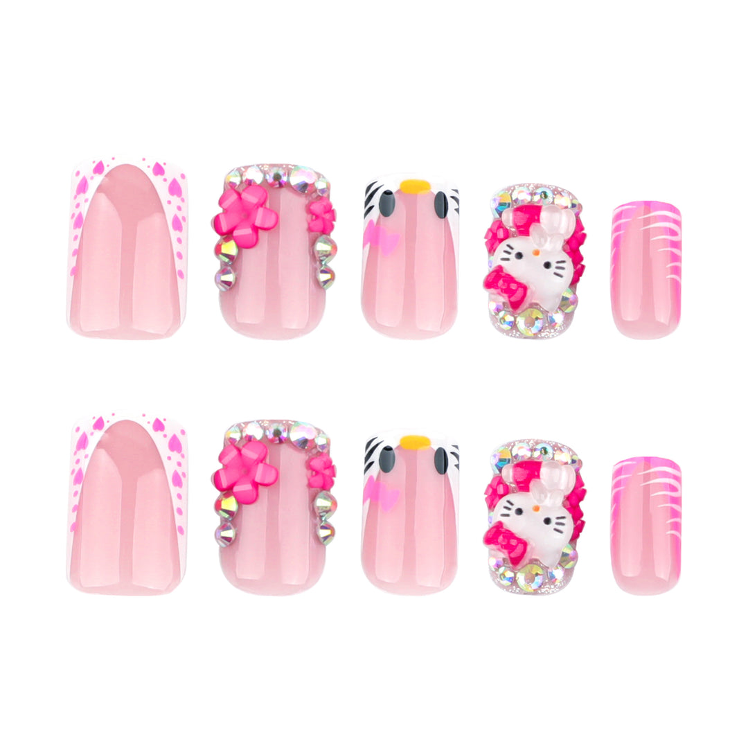Artistic Nail Art with Animal Motifs and Glitter Accents Stornfield