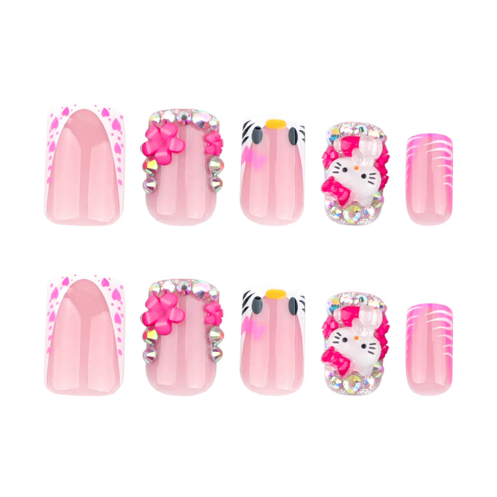 Artistic Nail Art with Animal Motifs and Glitter Accents Stornfield