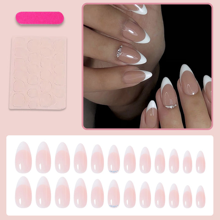 Artificial nail set with elegant French tip look and shimmering accents Stornfield