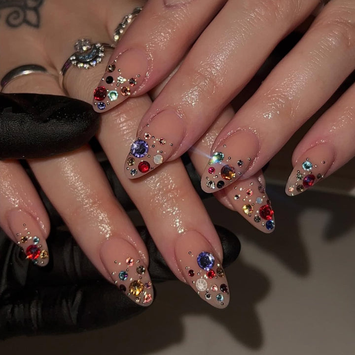 Artful stiletto nails with glitter accents Stornfield