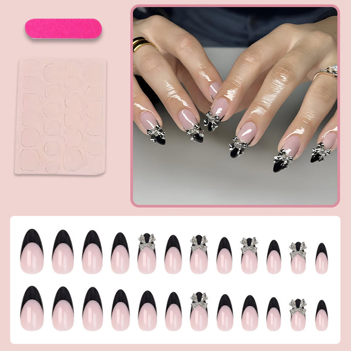 Nail art set with elegant tips and artistic embellishments Stornfield