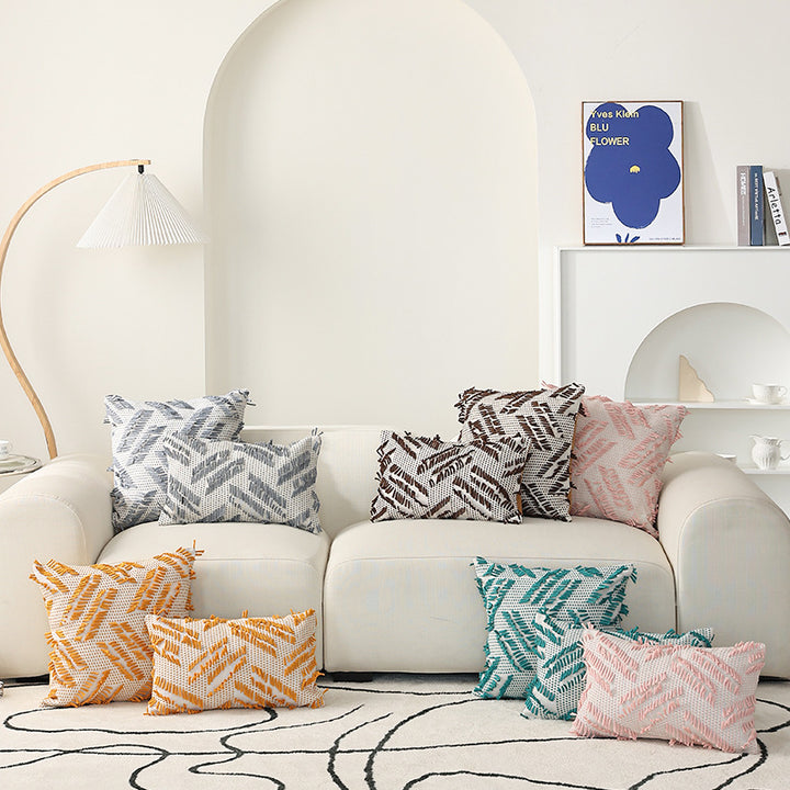 Decorative pillow with woven chenille relief structure and fringe application Stornfield