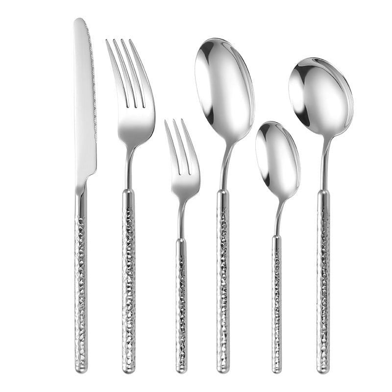 Elegant dessert spoon with elaborate handle design Stornfield