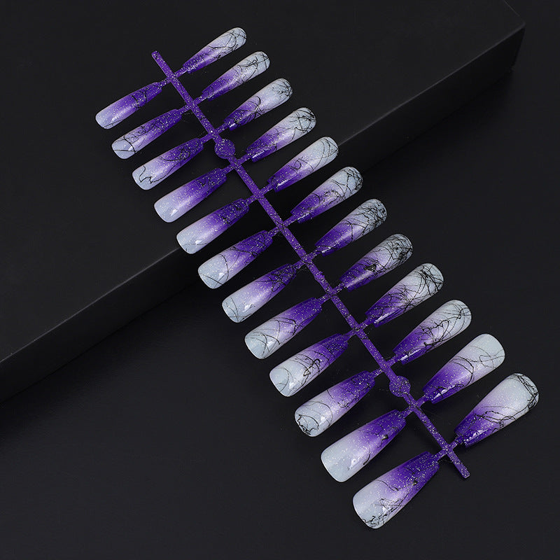 Artificial nails in modern ombre design with marbled accents Stornfield