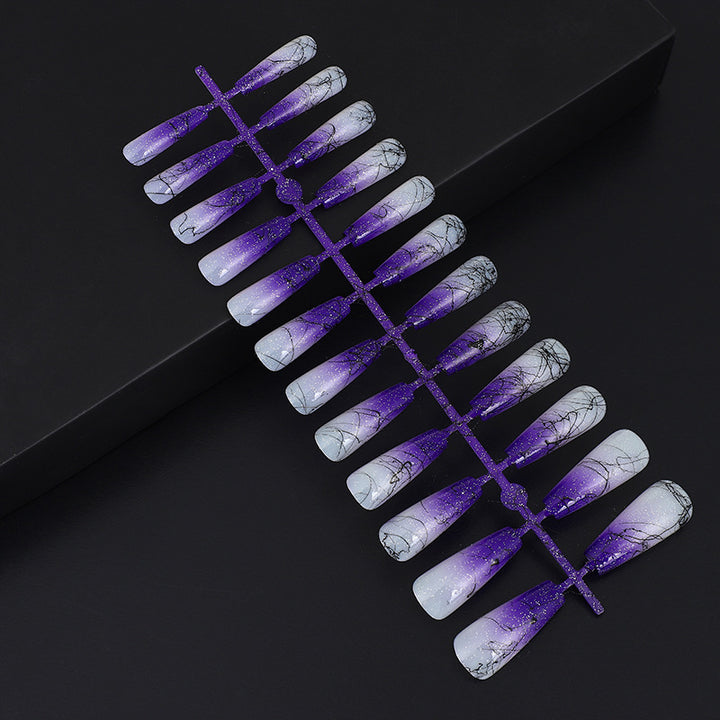 Artificial nails in modern ombre design with marbled accents Stornfield