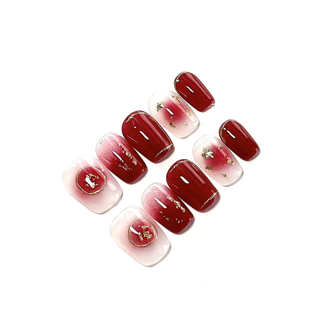 Artistic Press-On Nail Set with Floral and Golden Accents