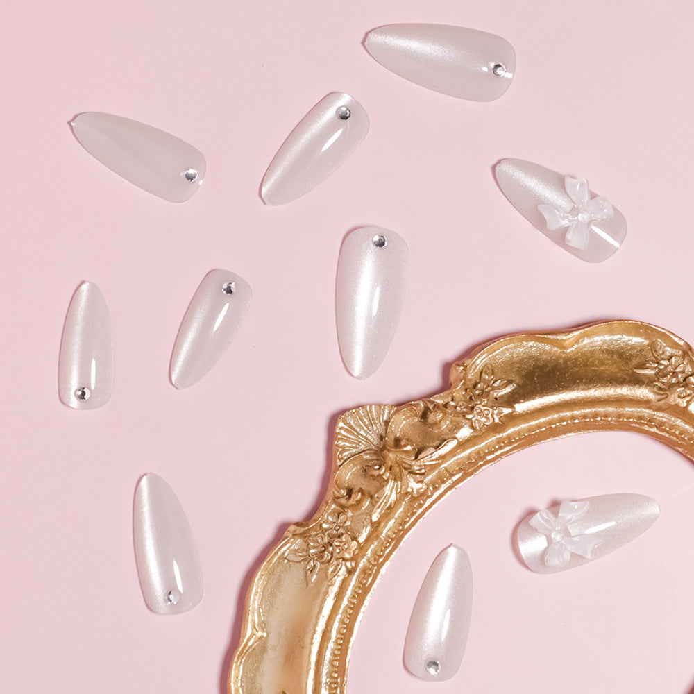 Elegant Stiletto-Shaped Press-On Nails with Decorative Bow Accents Stornfield