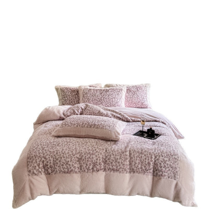 Plush bedding set with leopard faux fur and reversible function