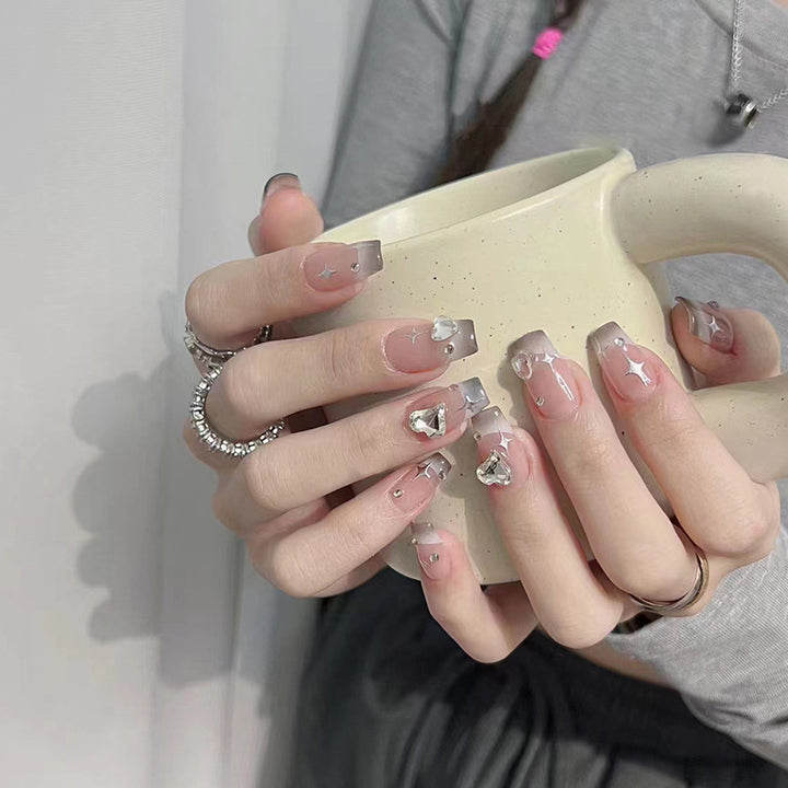 Acrylic nail set with sparkling crystal decorations Stornfield