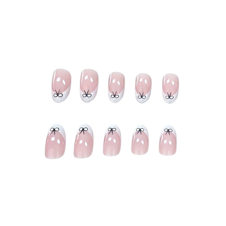 Artistic Bow-Embellished Nail Art Stornfield