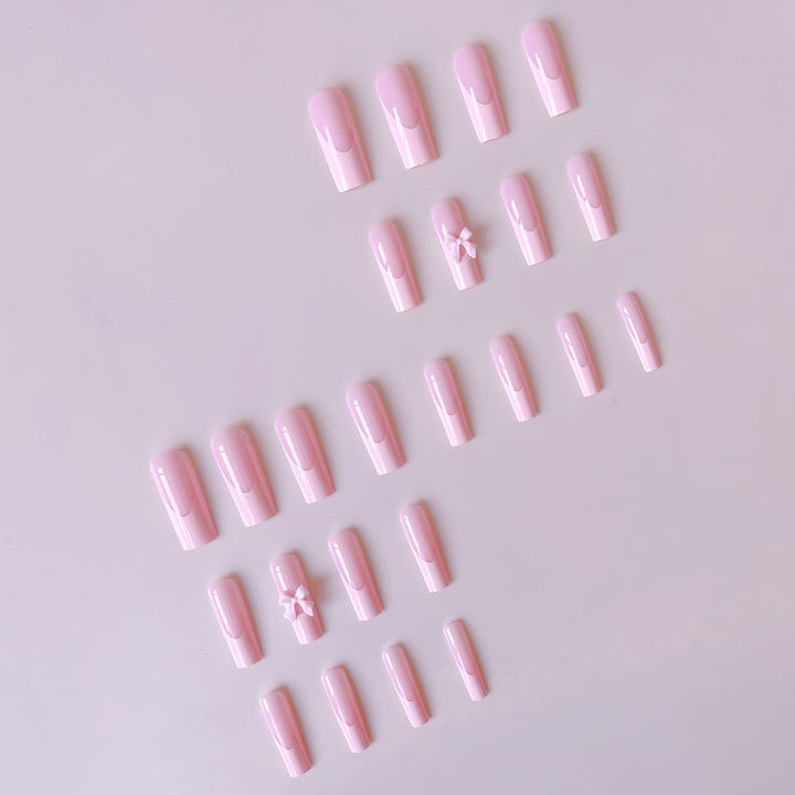 Artificial nail set with elegant tips and playful 3D design Stornfield