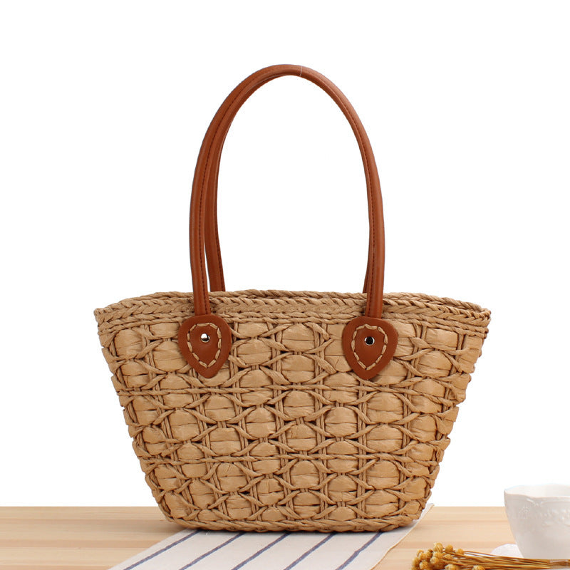 Handcrafted wicker bag with elegant leather accents Stornfield