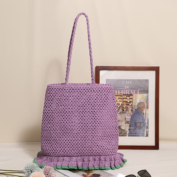 Handcrafted straw bag with fringed hem Stornfield