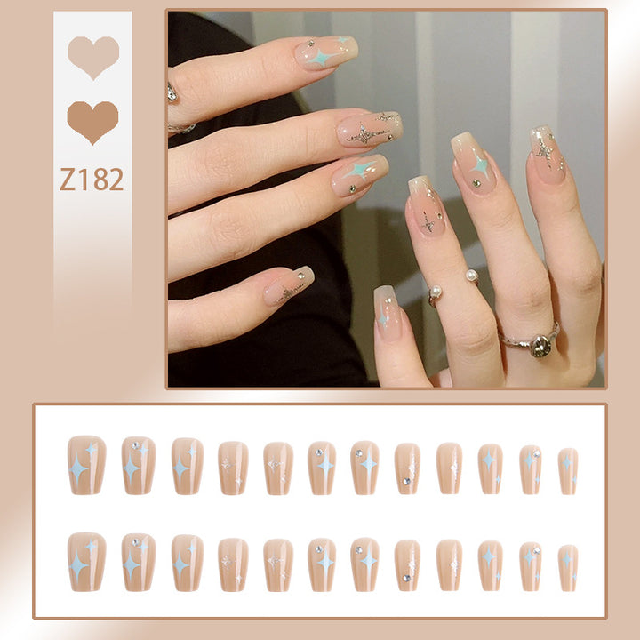 Acrylic nail set with sparkling star and glitter elements Stornfield