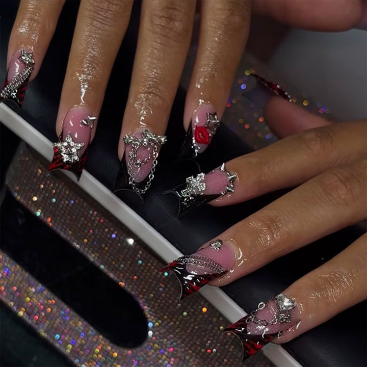 Artificial nails with glamorous 3D decorations and noble accents Stornfield