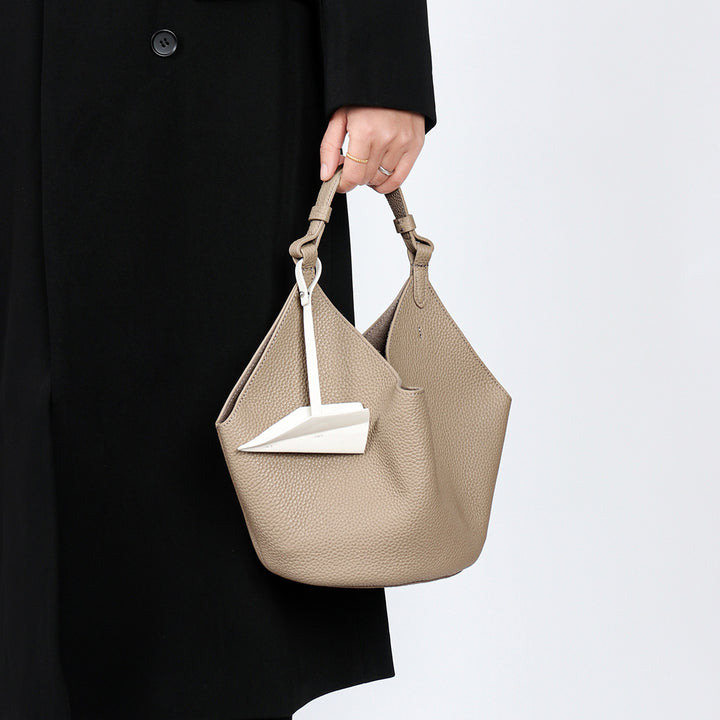Slouchy Pebbled Leather Hobo Bucket Bag with Top Handle and Geometric Silhouette