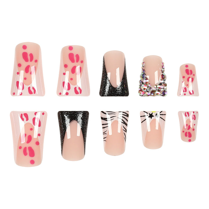Decorative Stiletto Press-On Nails with Artistic Pattern and Gem Accents Stornfield