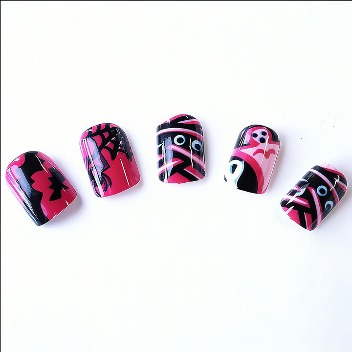 Halloween Artificial Nails with Playful Designs and Glitter Details Stornfield