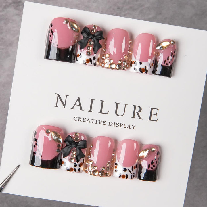 Decorative Press-On Nail Art with Gem Accents