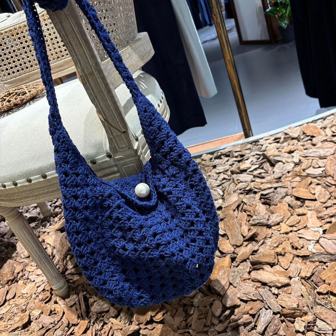 Handmade shoulder bag with bead closure Stornfield