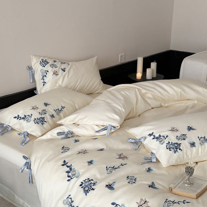 Luxury Cotton Sateen Bed Linen Set with Hand-Style Blue Floral Embroidery & Bow-Tie Shams