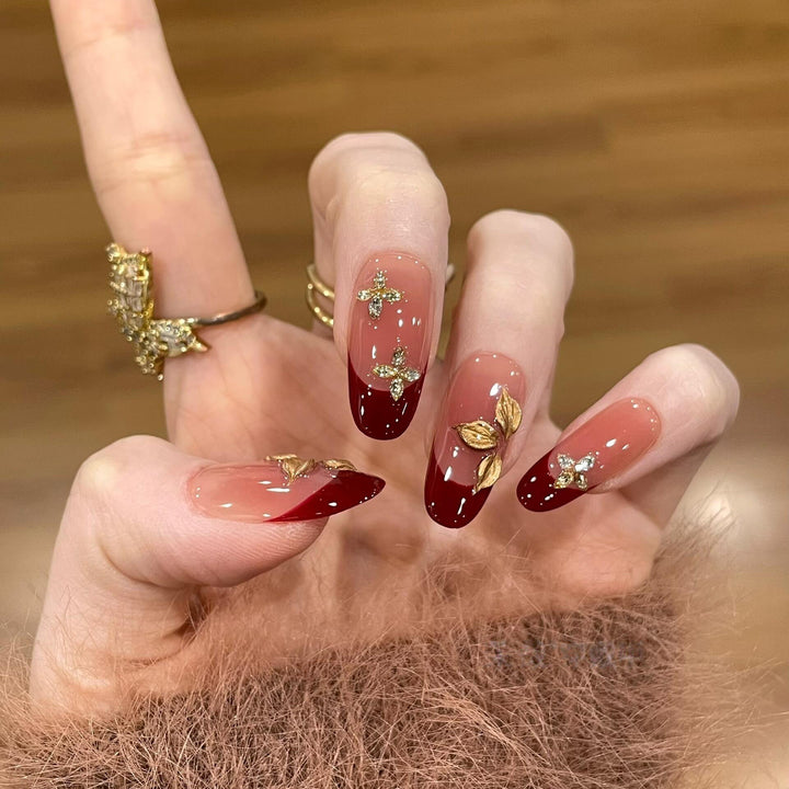 Artificial nails with luxurious flower and glitter elements Stornfield