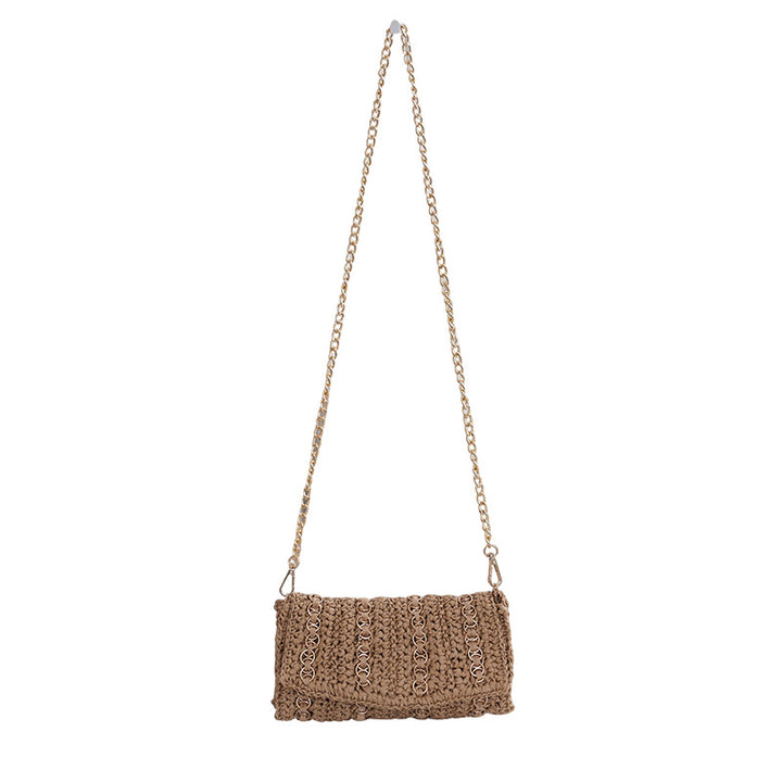 Clutch with chain shoulder strap and handcrafted macrame closure Stornfield