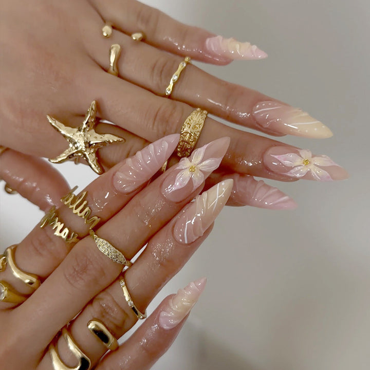 Artistic Long-Lasting Press-On Nail Extensions with Floral Patterns Stornfield