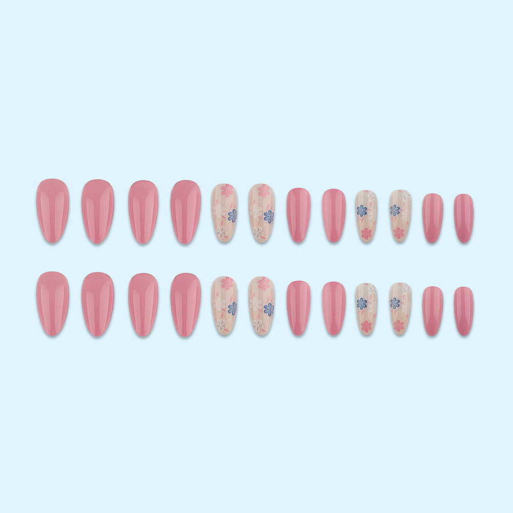 Stylish almond-shaped artificial nails with floral patterns Stornfield