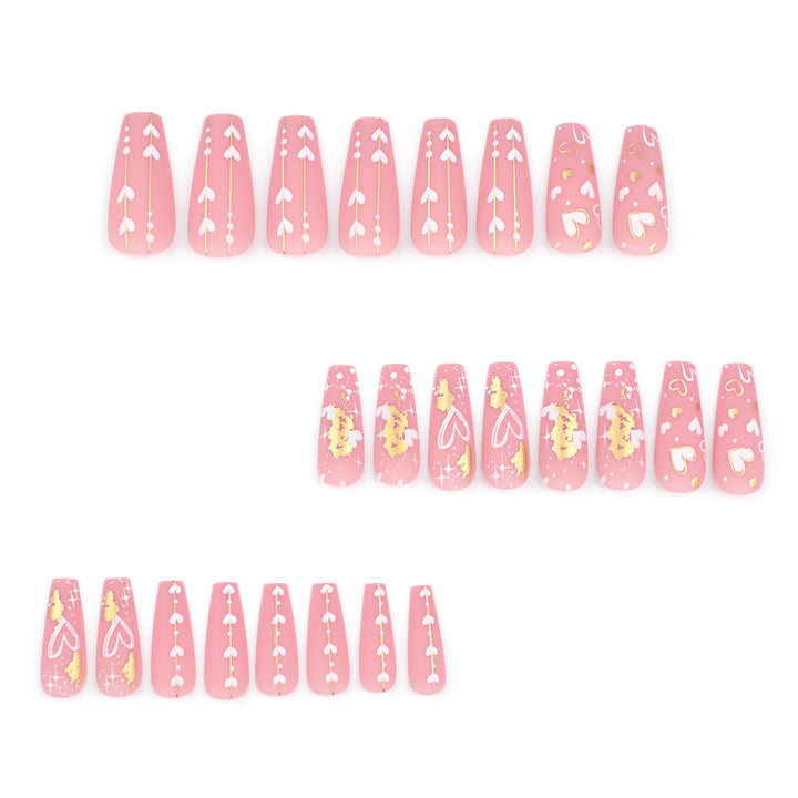 Artificial nail art with heart and glitter designs Stornfield