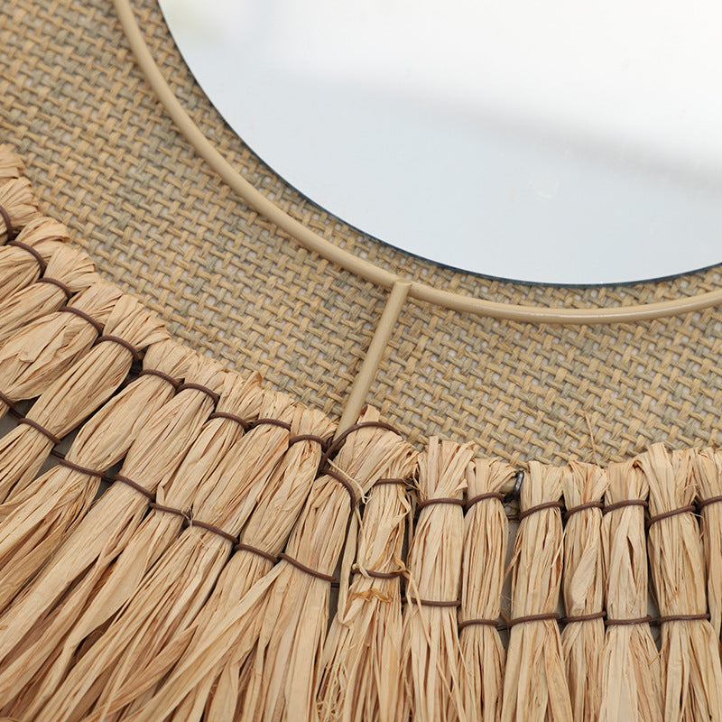 Decorative wall mirror with natural rattan frame Stornfield