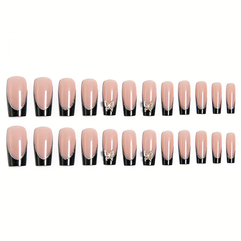 Glamorous artificial nails with detailed decorations Stornfield