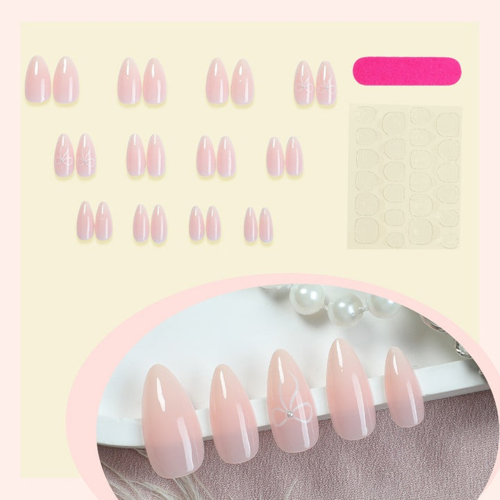 Elegant artificial nails with delicate patterns Stornfield