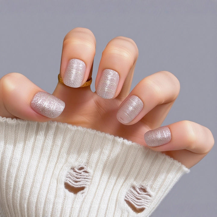 Glittering artificial nails with elegant metallic finish Stornfield