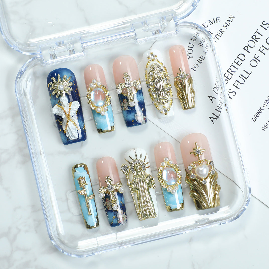 Elegant artificial nails with glamorous embellishments Stornfield