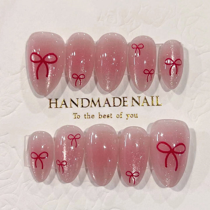 Artificial Nail Art with Bow Motif Stornfield