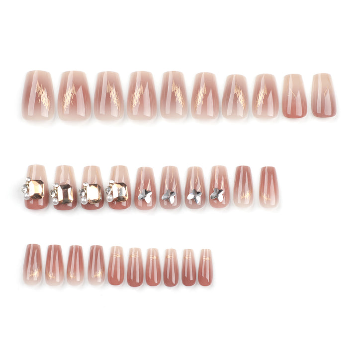 Artificial nail art with elegant jewelry accents Stornfield