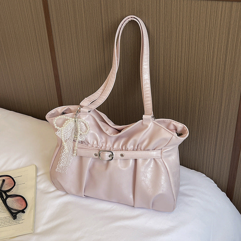 Elegant Leather Tote Bag with Decorative Accents