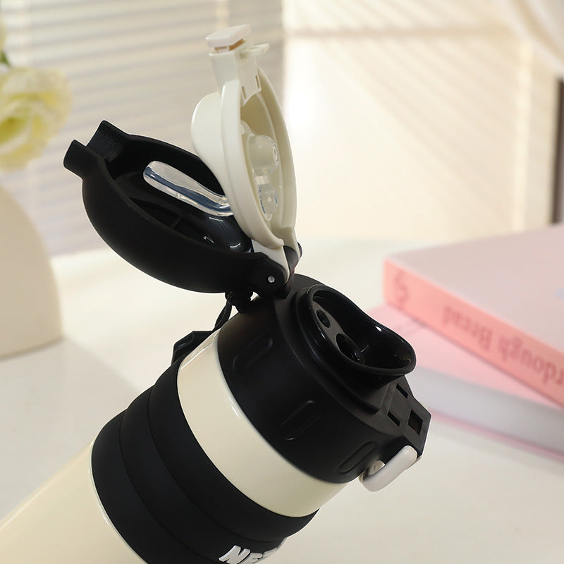 Insulated drinking bottle with a cute character design and practical carrying strap Stornfield