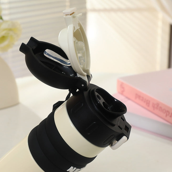 Insulated drinking bottle with a cute character design and practical carrying strap Stornfield