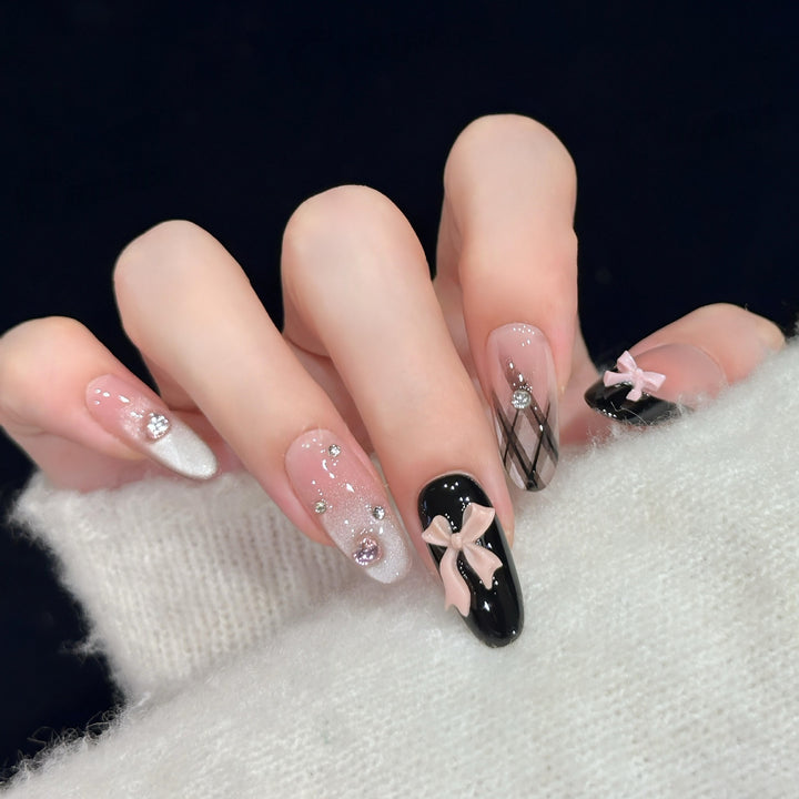 Artificial nail tips with elegant bows and glitter details Stornfield