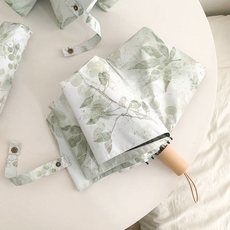 Women's folding umbrella with botanical print design Stornfield