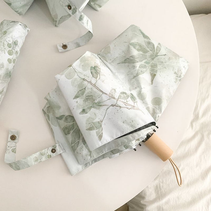 Women's folding umbrella with botanical print design Stornfield