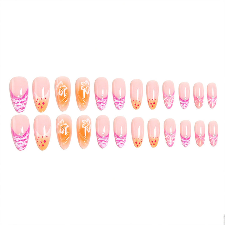Acrylic nail set with exotic flower patterns and glitter accents Stornfield