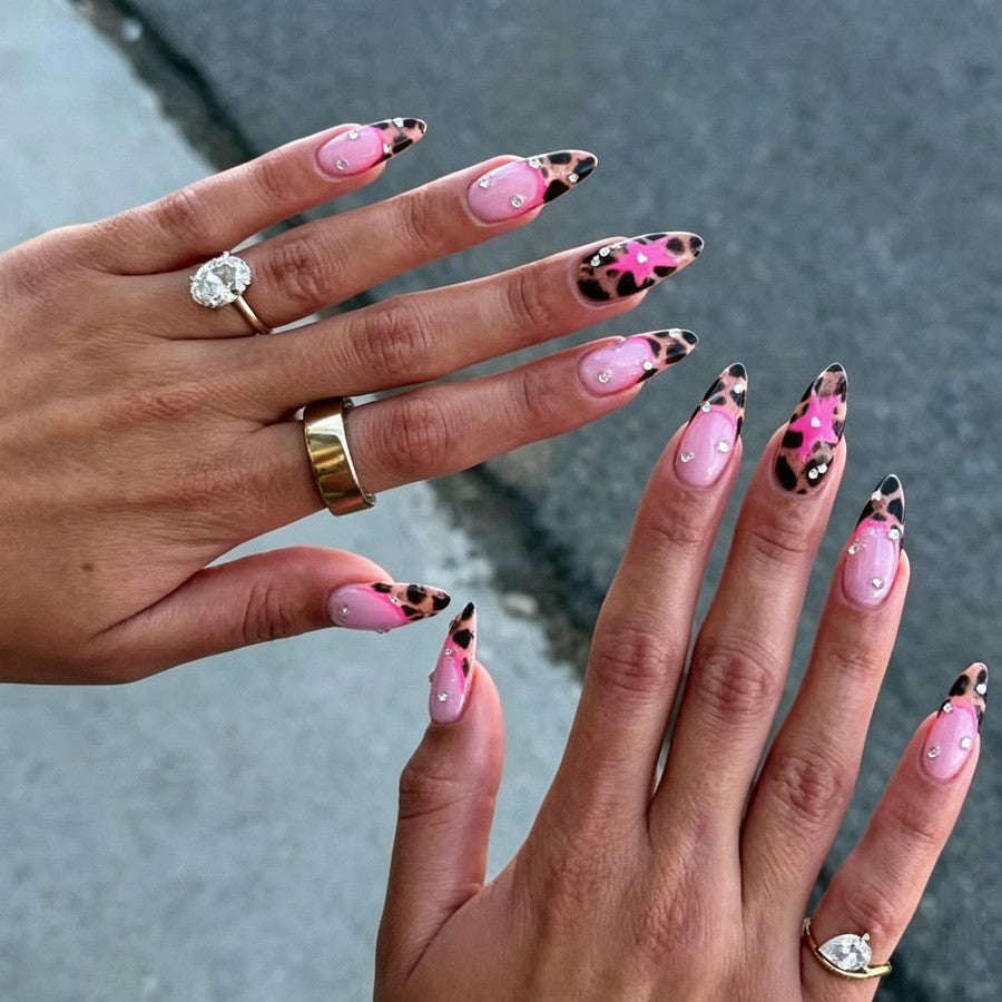 Nail set with glamorous leopard design and glitter elements Stornfield