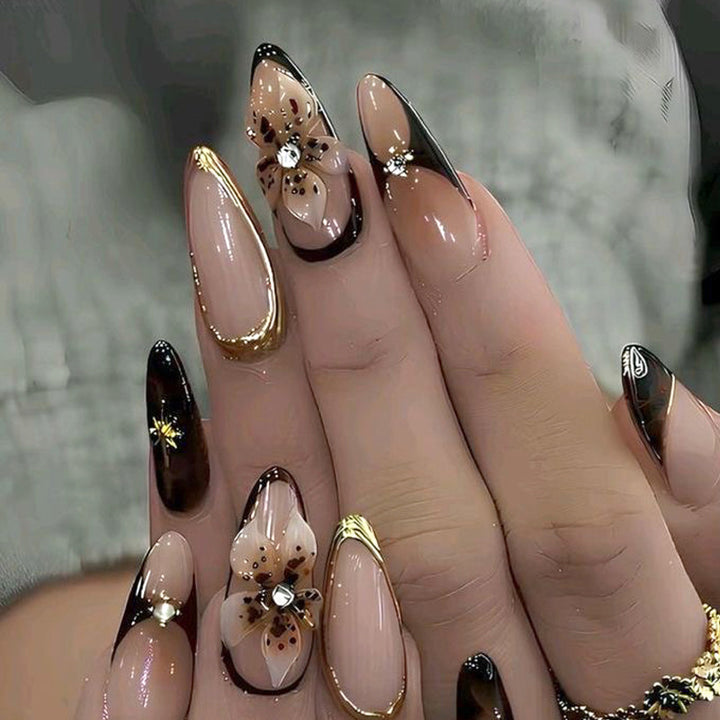 Artistic Press-On Nail Set with Elegant Floral and Abstract Designs Stornfield