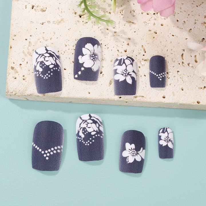 Artificial nails with elegant floral designs Stornfield
