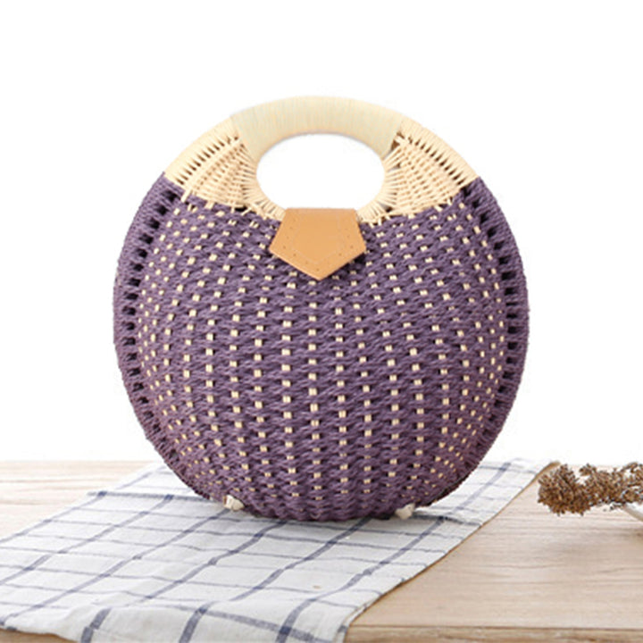Round straw bag with elegant leather handle Stornfield