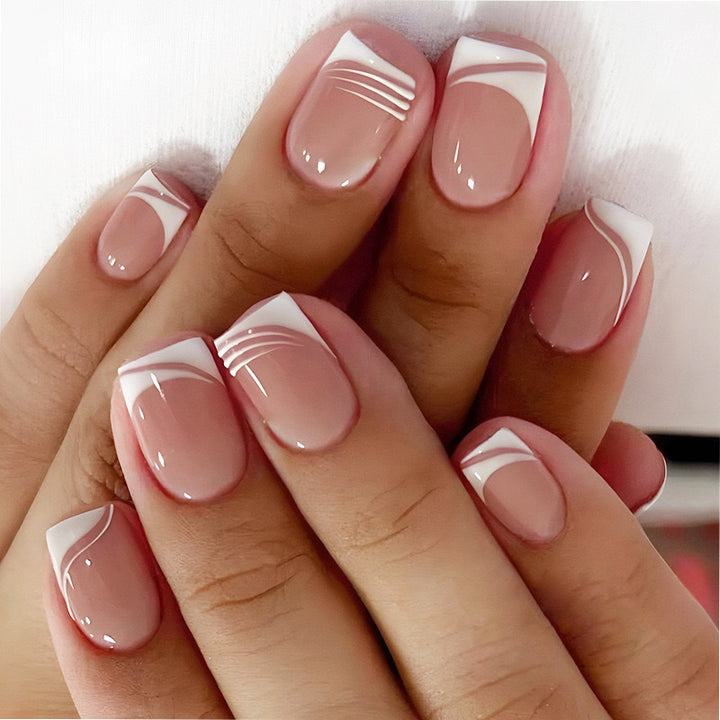 Artificial nail set with elegant French nail design and modern lines Stornfield