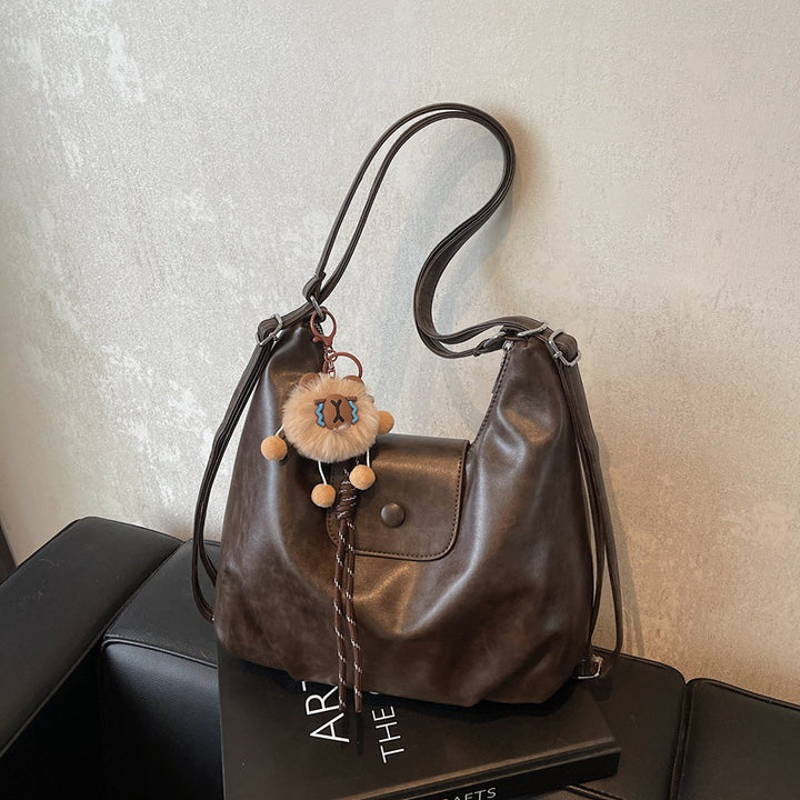 Modern shoulder bag with practical flap closure Stornfield